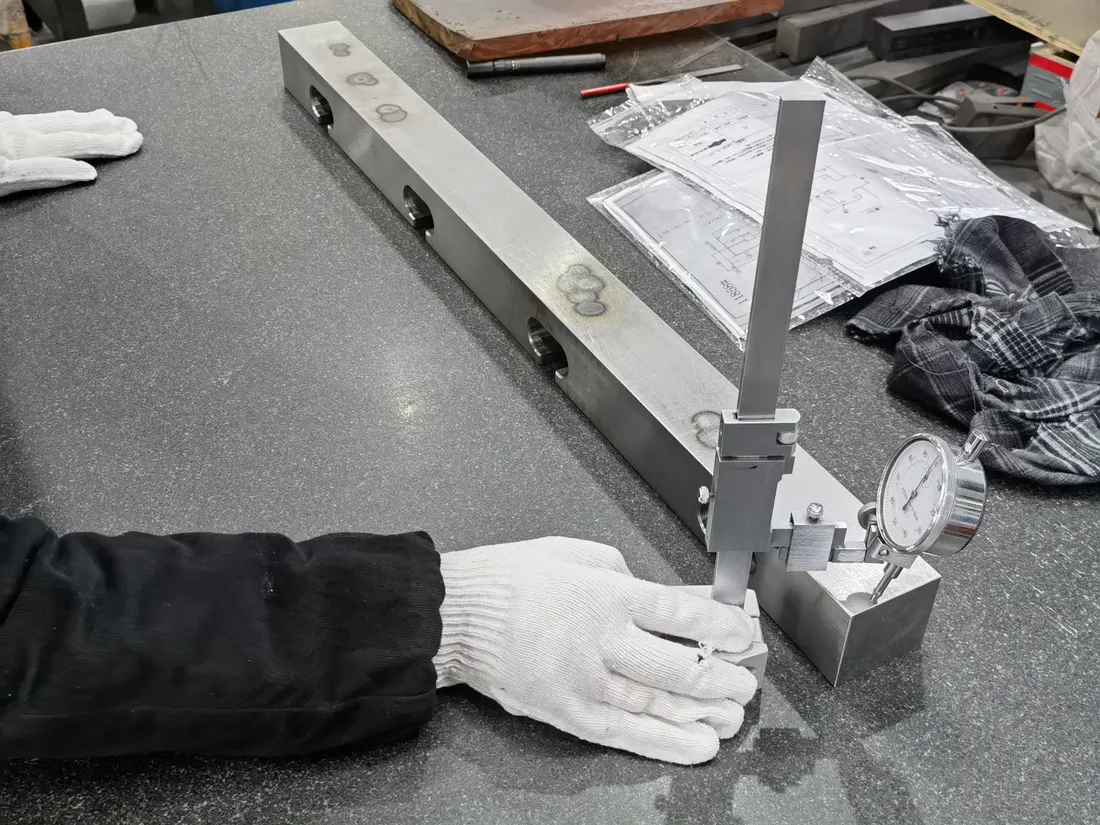 Inspector checking a tool with a height gauge